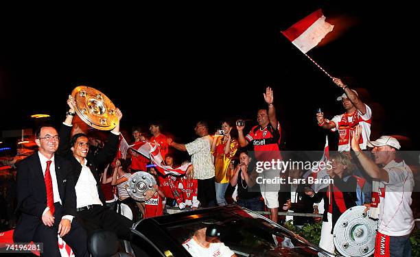 Erwin Staudt, president of VfB Stuttgart, and Fernando Meira celebrate with their fans during the VfB Stuttgart champion's party at Schloss square on...