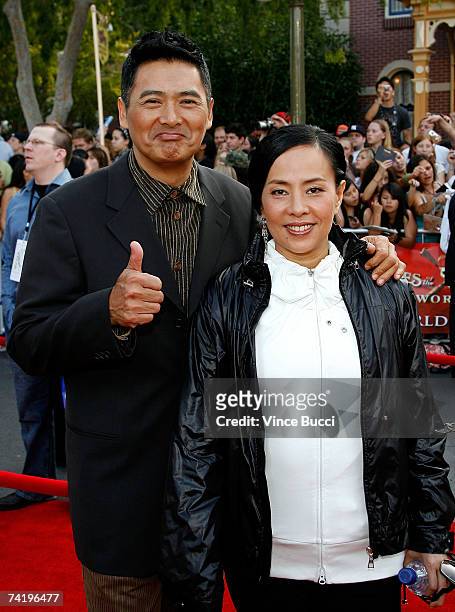 Actor Chow Yun-Fat and his wife Jasmine Chow attend the premiere of Walt Disney's "Pirates Of The Caribbean: At World's End" held at Disneyland on...