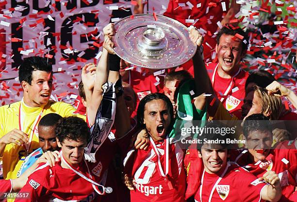 Fernando Meira of VfB Stuttgart celebrates with the trophy winning the German championships after the Bundesliga match against Energie Cottbus at the...