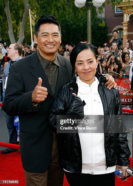 Actor Chow Yun-Fat and his wife Jasmine Chow attend the premiere of Walt Disney's "Pirates Of The Caribbean: At World's End" held at Disneyland on...