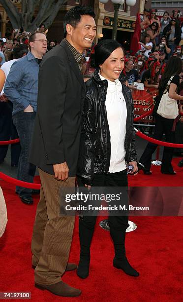 Actor Chow Yun-Fat and his wife Jasmine Chow attend the premiere of Walt Disney's "Pirates Of The Caribbean: At World's End" held at Disneyland on...