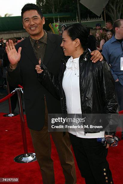 Actor Chow Yun-Fat and his wife Jasmine Chow attend the premiere of Walt Disney's "Pirates Of The Caribbean: At World's End" held at Disneyland on...