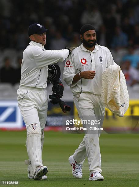 Matt Prior of England congratulates Monty Panesar after he took six wickets in the West Indies first innings during day four of the First Test...