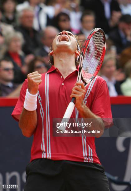 Roger Federer of Switzerland celebrates winning the final match against Rafael Nadal of Spain during day seven of the Tennis Masters Series Hamburg...