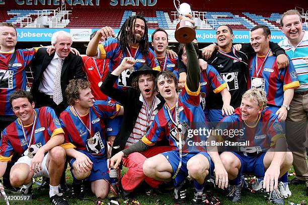 Pete Doherty's Babyshambles team celebrate winning the Music Industry Soccer Six event at Upton Park on May 20, 2007 in London, England.