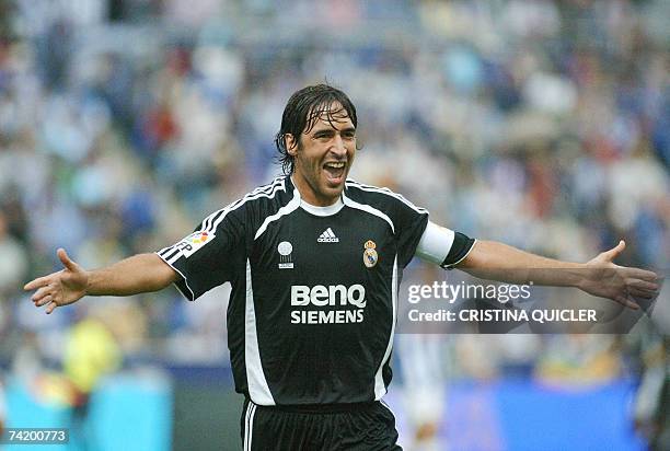 Real Madrid's Raul Gonzalez celebrates after Brazilian Robinho's goal against Recreativo Huelva during a Spanish league football match at the Nuevo...