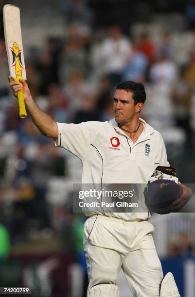 Kevin Pietersen of England acknowledges the crowd as he walks off after losing his wicket to Chris Gayle of West Indies during day four of the First...