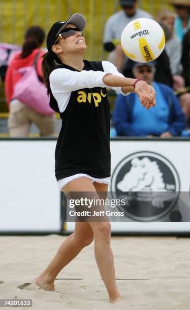 Actress Eva Longoria plays the ball during the "Spike for Hope" Celebrity Charity Beach Volleyball Tournament at the Hermosa Beach Pier on May 20,...