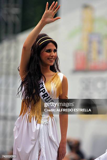 Miss Cyprus 2007, Polyvia Achilleos, poses for photographers during the runway with traditional dresses at the Reforma Avenue in Mexico City, 20 May...