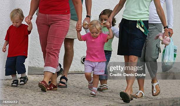 Sean and Amelie McCann are droped off by their mother Kate McCann at the Ocean Club holiday resort on May 21, 2007 in Praia da Luz, Portugal. Kate's...