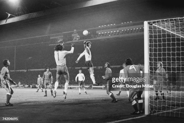 Mick Channon of England causes problems for the Polish defence during a World Cup qualifying match at Wembley, London, 17th October 1973. The final...