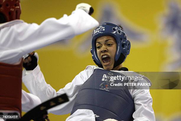 Karine Sergerie of Canada clashes with Park Hye-mi of Korea in the Female Lightweight final in the World Taekwondo Championship in Beijing 21 May...