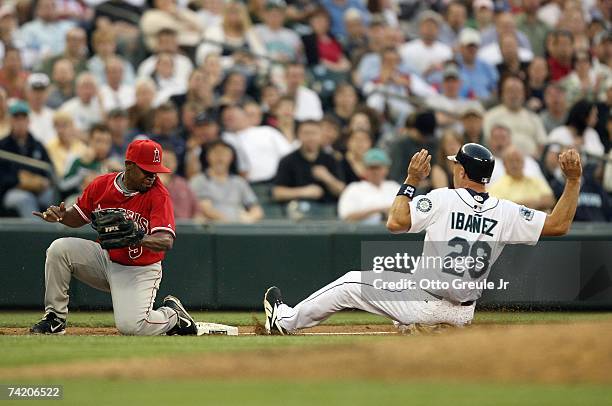 Raul Ibanez of the Seattle Mariners slides to secondbase against Chone Figgins of the Los Angeles Angels of Anahiem on May 15, 2007 at Safeco Field...