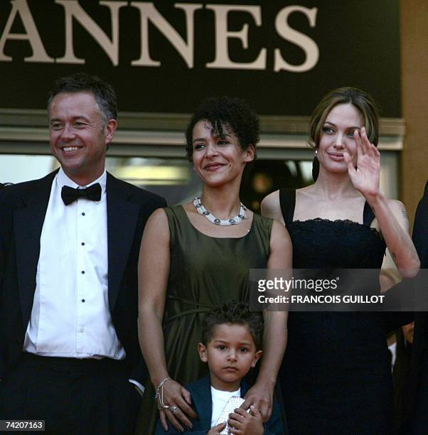 British director Michael Winterbottom, French journalist and writer Mariane Pearl and her son Adam and US actress Angelina Jolie pose 21 May 2007...