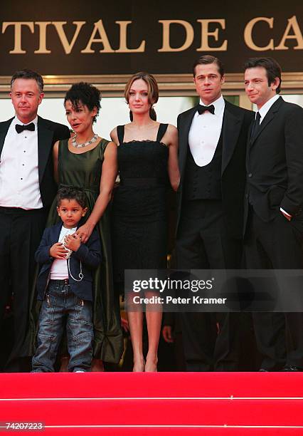 Director Michael Winterbottom, author Mariane Pearl with her son, actors and producers Angelina Jolie, Brad Pitt and actor Dan Futterman attend the...