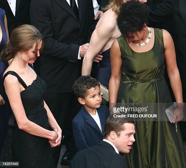 Actress Angelina Jolie and French journalist and writer Mariane Pearl look 21 May 2007 at Adam Pearl, son of murdered journalist Daniel Pearl, next...