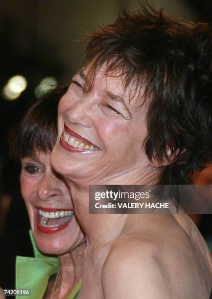 British actresses Geraldine Chaplin and actress, singer and director Jane Birkin laugh 21 May 2007 upon arriving at the Festival Palace in Cannes,...