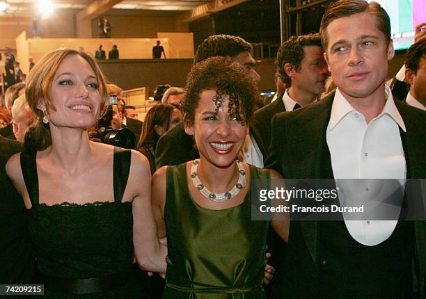 Actress Angelina Jolie , author Mariane Pearl and actor Brad Pitt attend the premiere for the film "A Mighty Heart" at the Palais des Festivals...