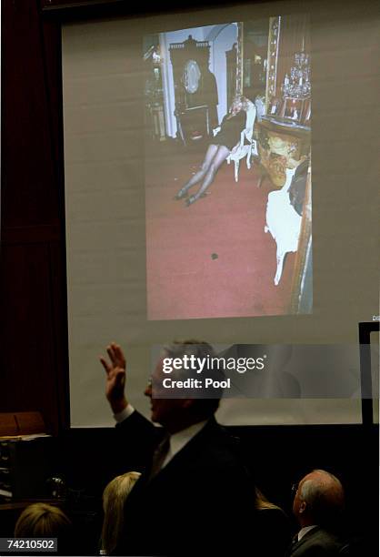 Defense attorney Bradley Brunon shows the view from the crime scene to Adriano De Souza, former driver for music producer Phil Spector, during cross...