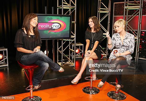 Actress Carrie Ann Inaba is interviewed by show host Kimberly Caldwell and guest host Kristin Hope on the set of "Reality Chat" at the TV Guide...