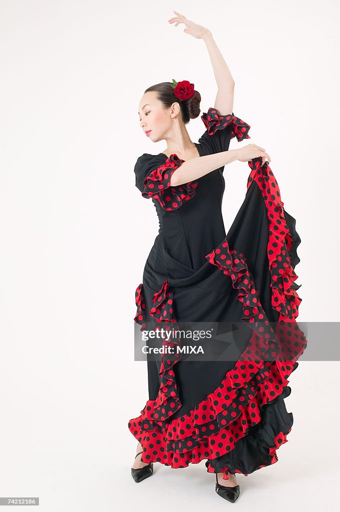 Young woman dancing the flamenco