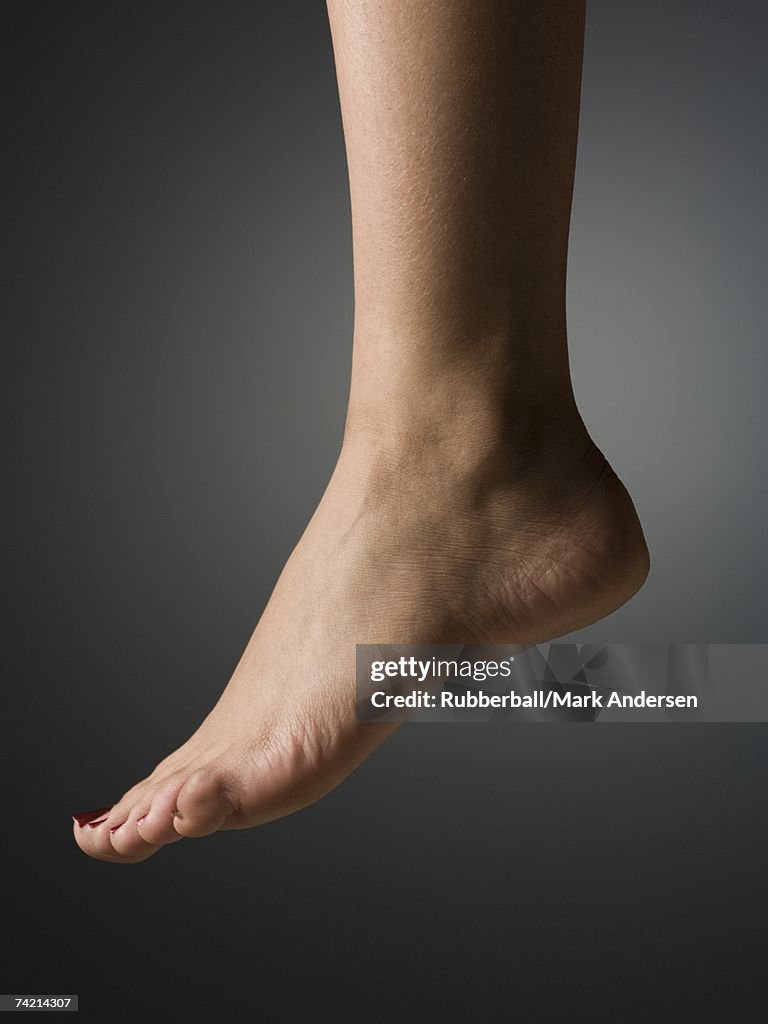 Detailed view of female bare foot and heel profile