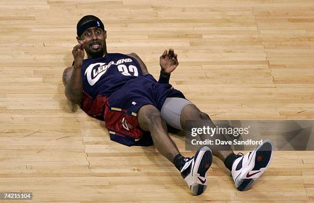 Larry Hughes of the Cleveland Cavaliers looks up from the court after he fell down on a play against the Detroit Pistons in Game One of the Eastern...