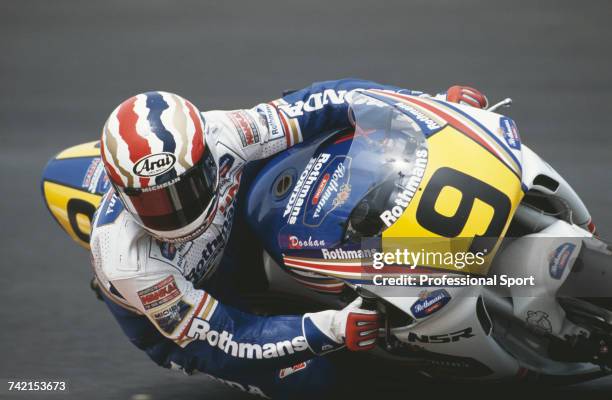 Australian Grand Prix motorcycle road racer Mick Doohan rides the 500cc Honda to finish in 3rd place in the 1990 Nations motorcycle Grand Prix at the...