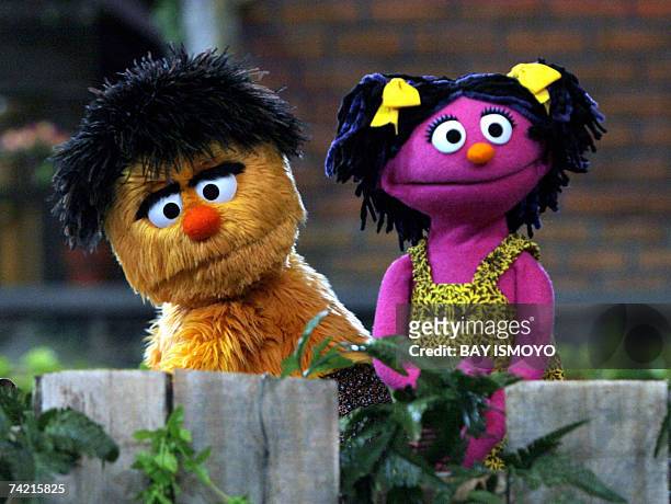 Two of the four new characters of "Jalan Sesama," the Indonesian version of Sesame Street, Momon and Putri are pictured during a ceremony in Jakarta,...
