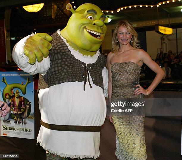 Hollywood actress Cameron Diaz and movie character 'Shrek' arrive for the Australian premier of the animated movie 'Shrek The Third' in Sydney, 22...