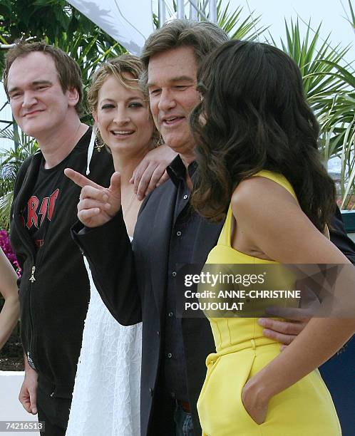 Director Quentin Tarentino, New Zealander actress Zoe Bell, US actor Kurt Russell and US actress Rosario Dawson pose 22 May 2007 during a photcall...