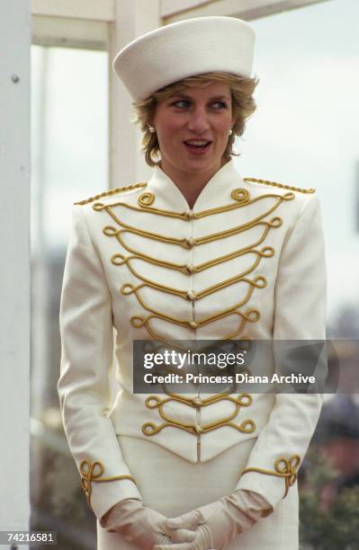 The Princess of Wales visits Sandhurst Royal Military Academy in Surrey, wearing a Catherine Walker suit and a hat by Graham Smith at Kangol, April...