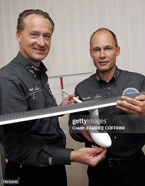 Swiss scientist-adventurer and pilot Bertrand Piccard , the first man ever to achieve a non-stop balloon flight around the world, poses with Solar...
