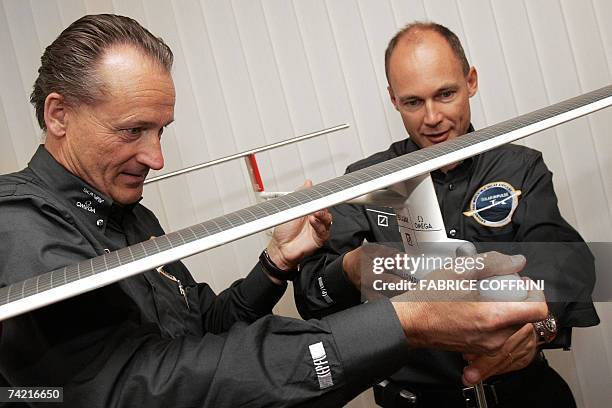 Swiss scientist-adventurer and pilot Bertrand Piccard , the first man ever to achieve a non-stop balloon flight around the world, poses with Solar...