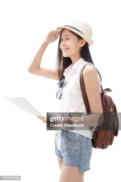 young woman on travel checking map - sun visor isolated stock pictures, royalty-free photos & images