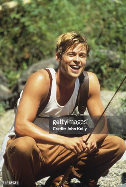 Brad Pitt smiles while fishing on the Gallatin River during the filming of "A River Runs Through It" in 1991.