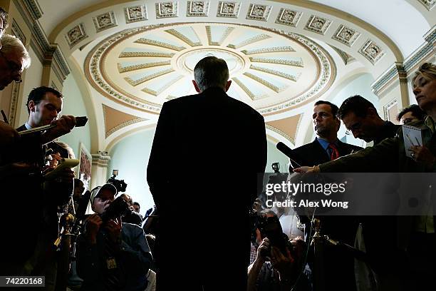 Senate Majority Leader Harry Reid talks to reporters after the weekly Democratic policy luncheon at the Capitol May 22, 2007 in Washington, DC. Reid...