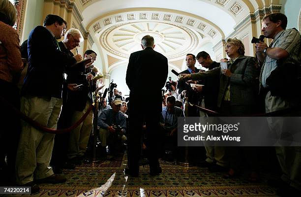 Senate Majority Leader Harry Reid talks to reporters after the weekly Democratic policy luncheon at the Capitol May 22, 2007 in Washington, DC. Reid...