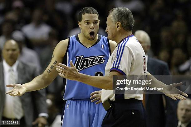Deron Williams of the Utah Jazz argues a call with referee Jack Nies against the San Antonio Spurs during Game Two of the Western Conference Finals...