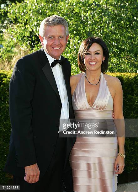 Colin Montgomerie of Scotland and partner Gaynor Knowles pose in evening dress at the Tour Dinner prior to the BMW Championship at The Wentworth Club...