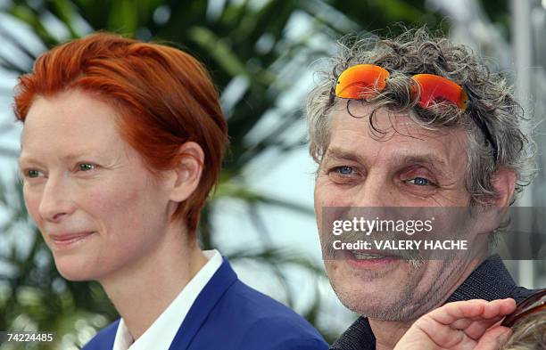 British actress Tilda Swinton and Hungarian actor Janos Derzsi pose 23 May 2007 during a photocall for Hungarian director Bela Tarr's film 'The Man...