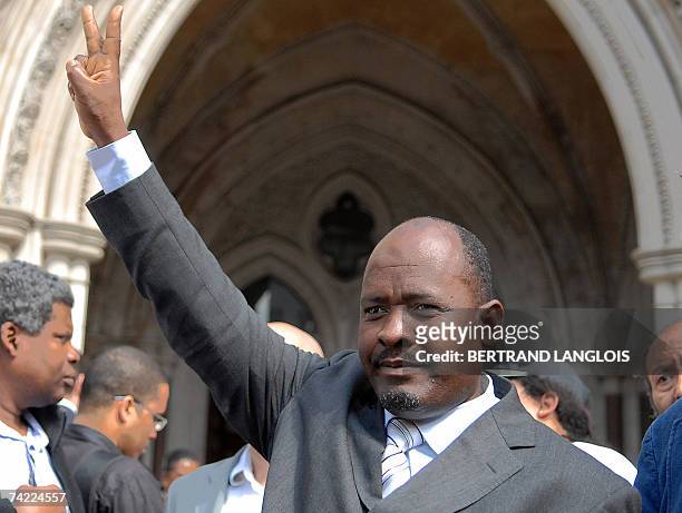 London, UNITED KINGDOM: Louis Olivier Bancoult, Chairman of the Chagos Refugees Group, celebrates outside The High Court in central London, 23 May...