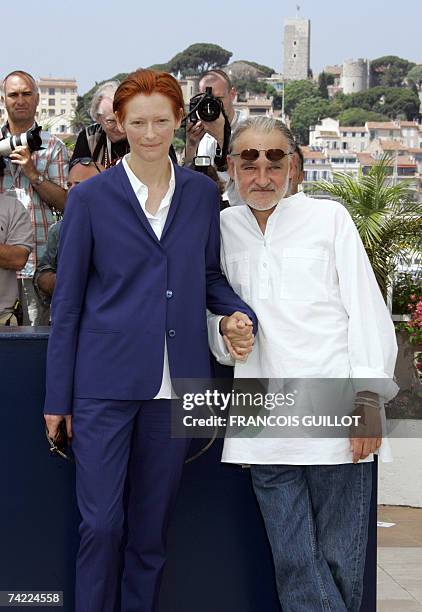 British actress Tilda Swinton and Hungarian director Bela Tarr pose 23 May 2007 during a photocall for their film 'The Man from London' in the...