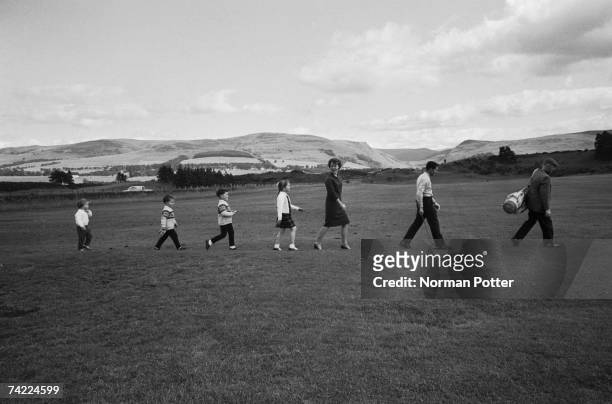 South African golfer Gary Player with his wife Vivienne and their children at Gleneagles, Scotland, before the Open, 2nd July 1966.
