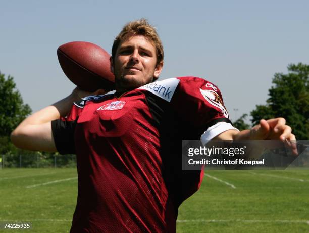 Tennis player Mardy Fish throws the ball during the US ARAG team visit to the Rheinfire American football team at the LTU Arena during Day 4 of the...
