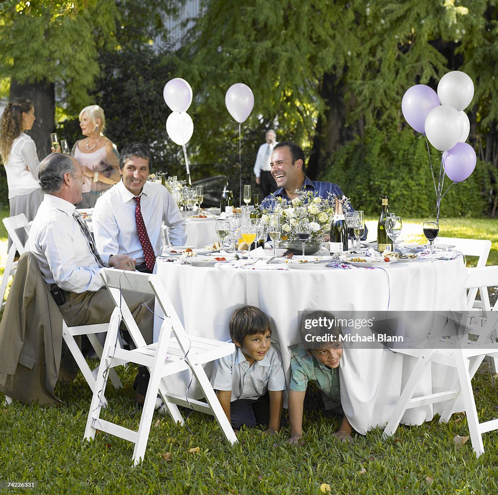 Family enjoying garden party