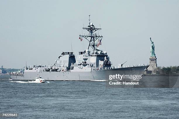 In this handout from the Coast Guard, the USS Oscar Austin moves up the Hudson River for during the Parade of Ships to begin the Fleet Week...