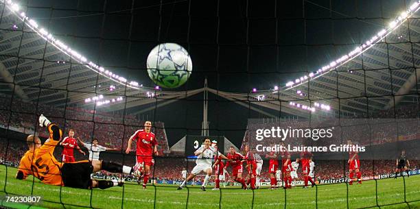 Filippo Inzaghi of Milan turns away to celebrate after scoring the opening goal past the diving Pepe Reina of Liverpool during the UEFA Champions...