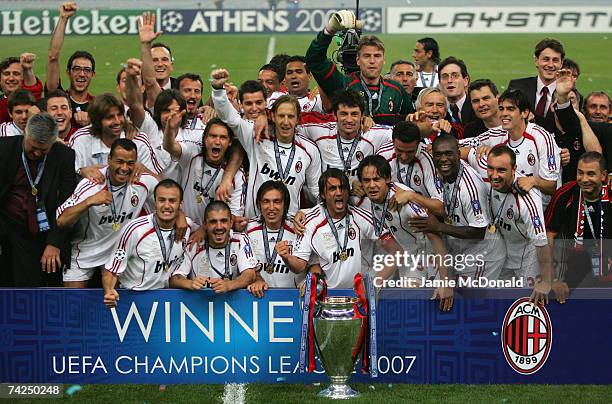 Milan captain, Paolo Maldini and his team celebrate with the trophy following their 2-1 victory during the UEFA Champions League Final match between...