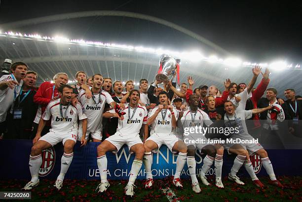 Milan players celebrate with the trophy following their 2-1 victory during the UEFA Champions League Final match between Liverpool and AC Milan at...